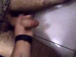 Stranger Handjob in a Public Restroom Glory Hole