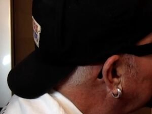 Old man caught cocksucking in gloryhole