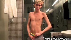 Skinny Twink Plays With His Dick In The Bathroom Solo